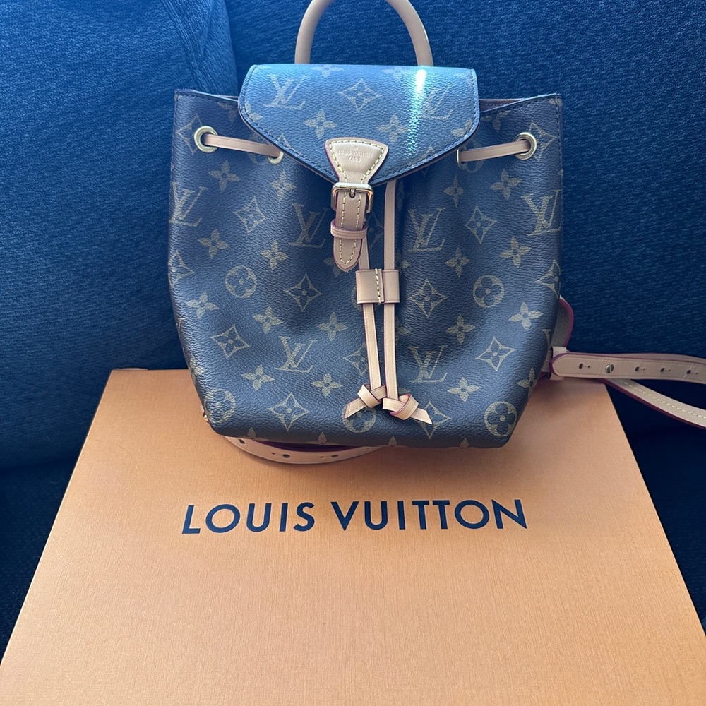 Louis Vuitton Brown Backpack with Iconic Monogram Canvas and Drawstring Closure